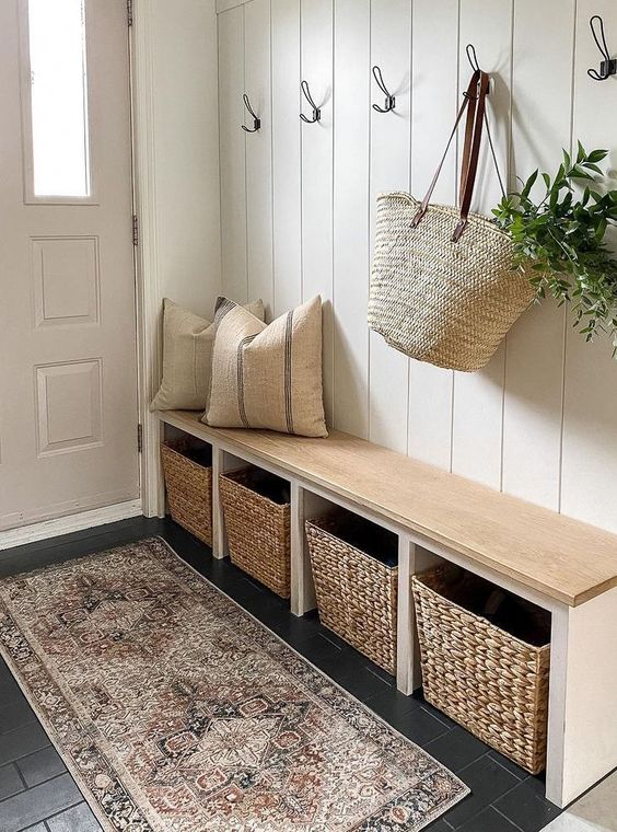 small apartment entryway with bench
