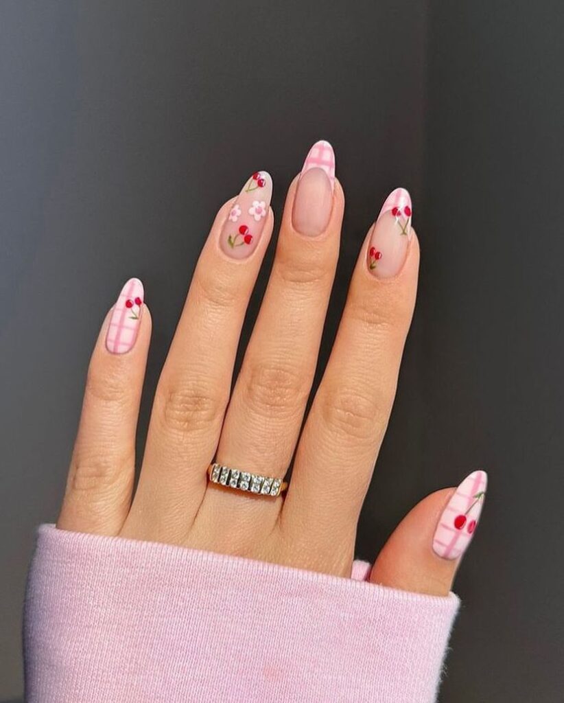 classy spring nails with pink plaid and cherry accents