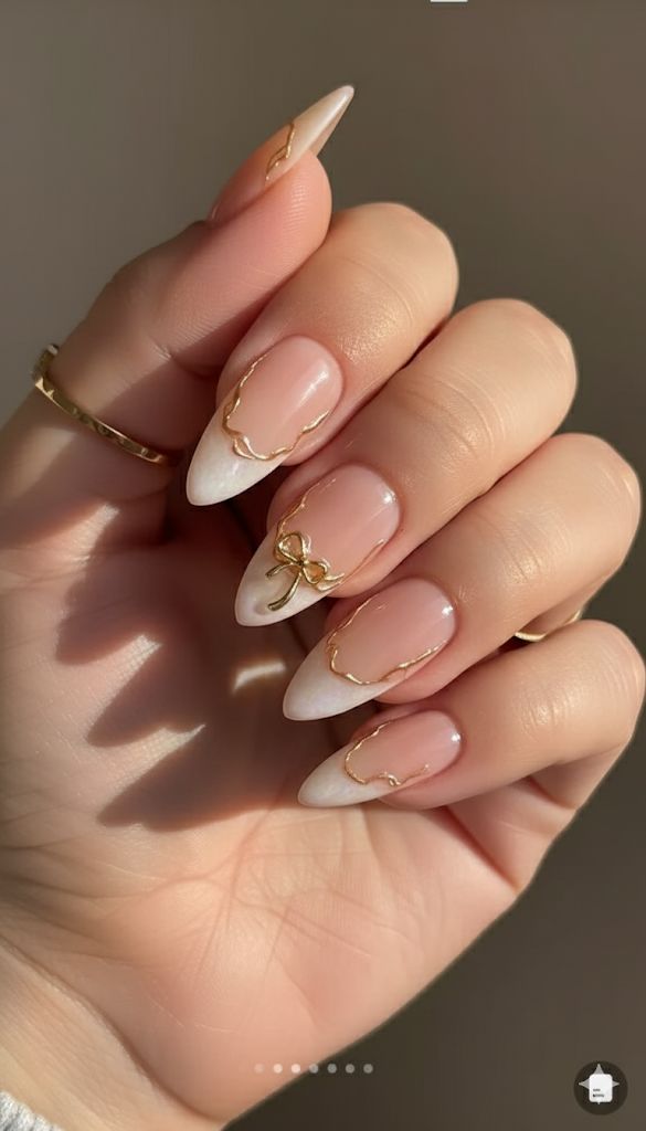 march nails ideas simple with gold bow detail