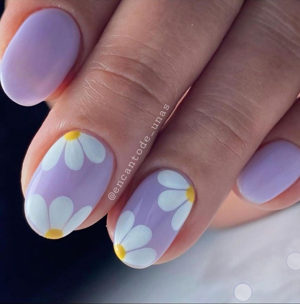short spring nail designs with a purple base and floral design